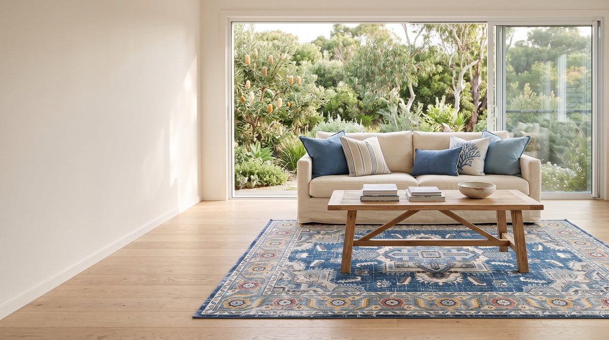 Blue Persian-style rug in a coastal living room