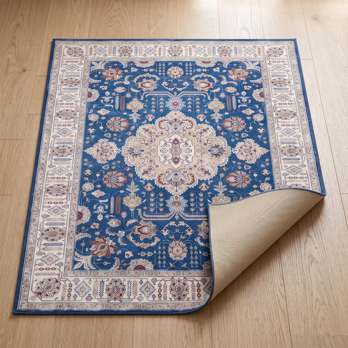 Cobalt Persian-style rug with one corner turned back to show the non-slip backing