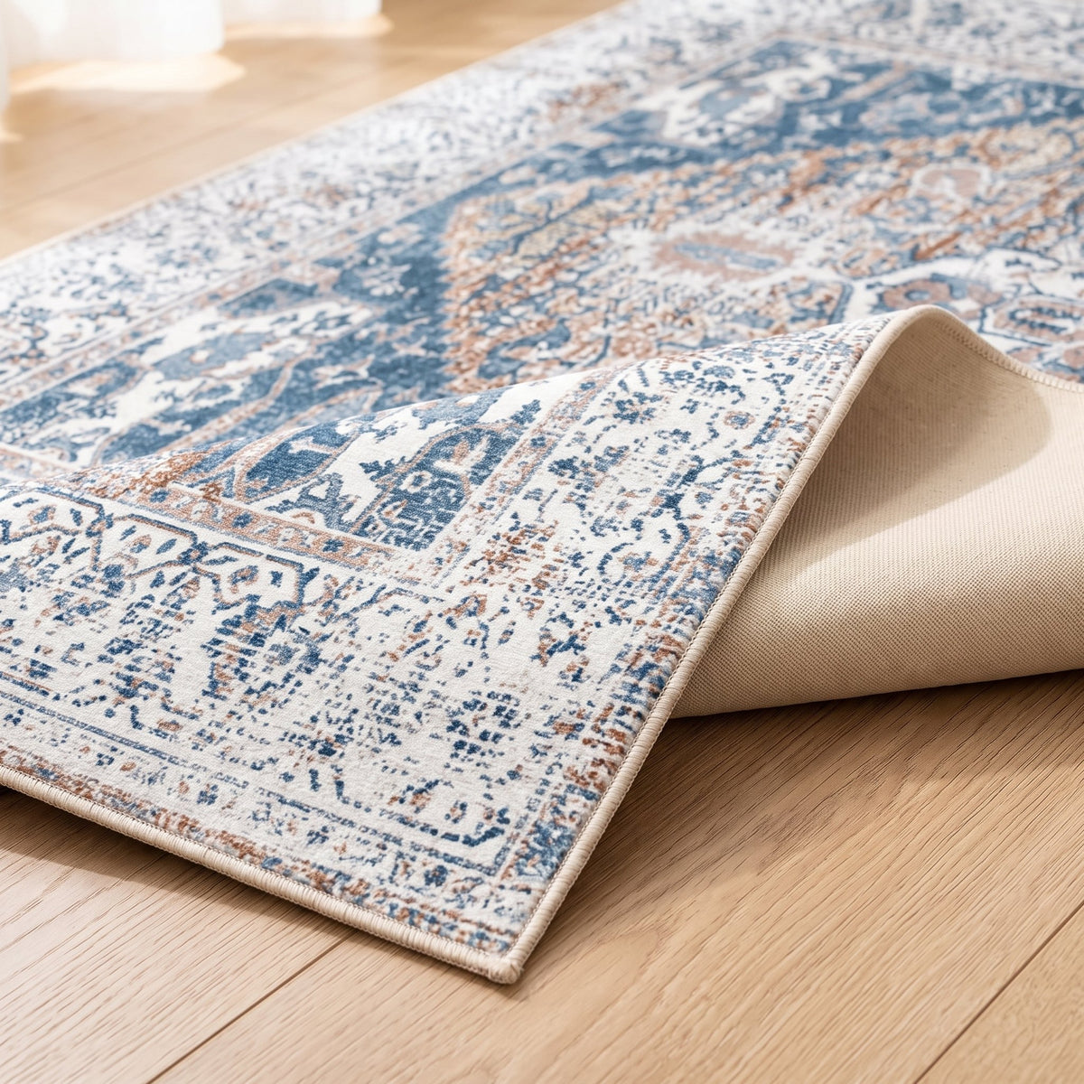 Luna Persian-style rug, folded corner showing the low pile and non-slip backing