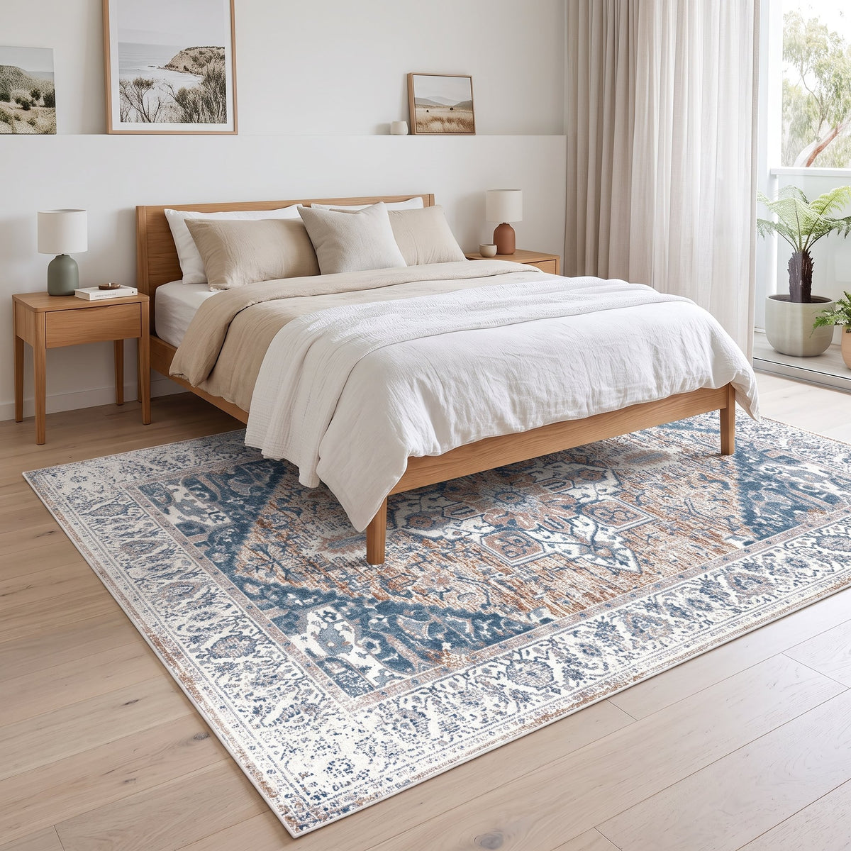Luna Persian-style rug under a bed in a calm bedroom