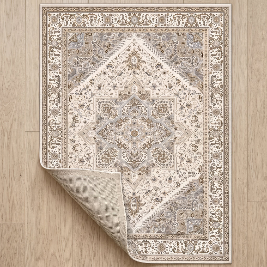 Sandstone Persian-style rug with one corner turned back to show the non-slip backing